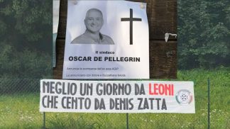 Dissenso scomposto: l’epigrafe del sindaco di Belluno e lo striscione contro il consigliere feltrino